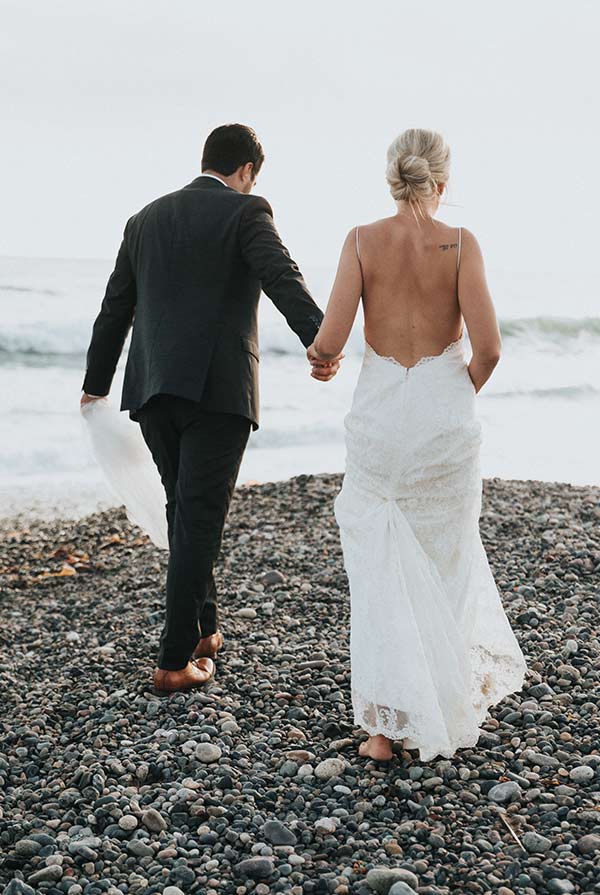 Couple eloping on a secluded beach